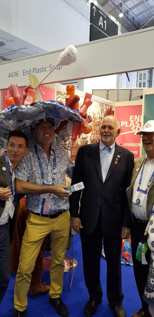 Barry Rassin, President Rotary, joins in